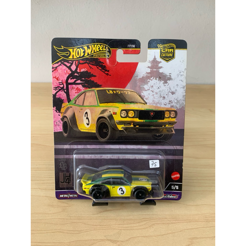 hot wheels premium lbwk mazda rx-3 kuning