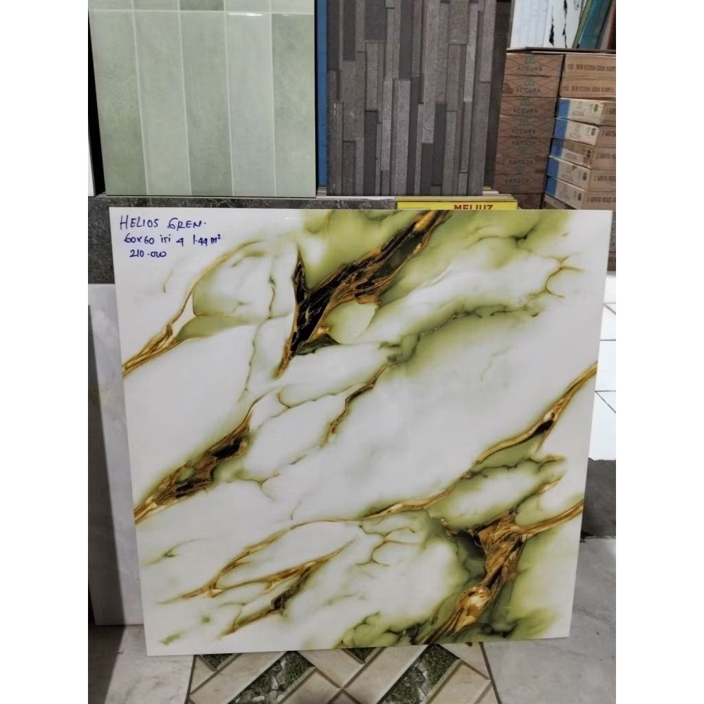 Granit lantai merek ikad tipe Helios Green Motif Marmer hijau dan urat emas