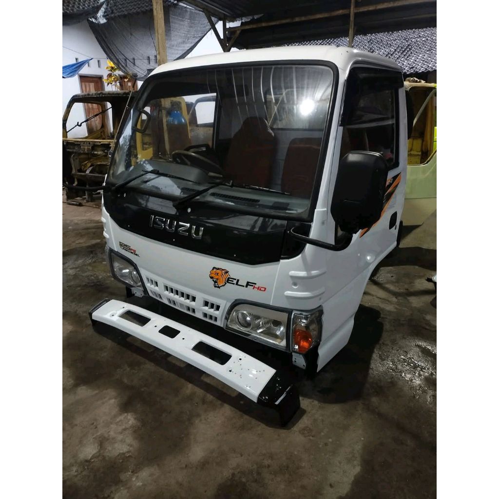 cabin Isuzu Elf macan