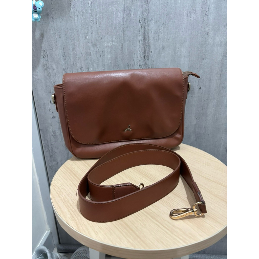 POVILO NOMI BROWN SLING BAG NOT TIA THIS IS APRIL ROOSY SNY THE LABEL VALLICE