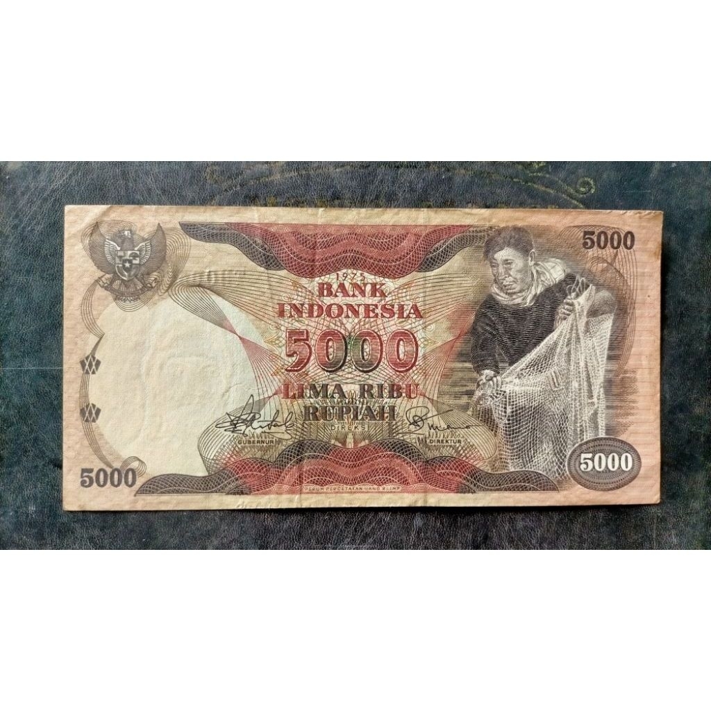 Langka uang 5000 penjala ikan 1975 bagus