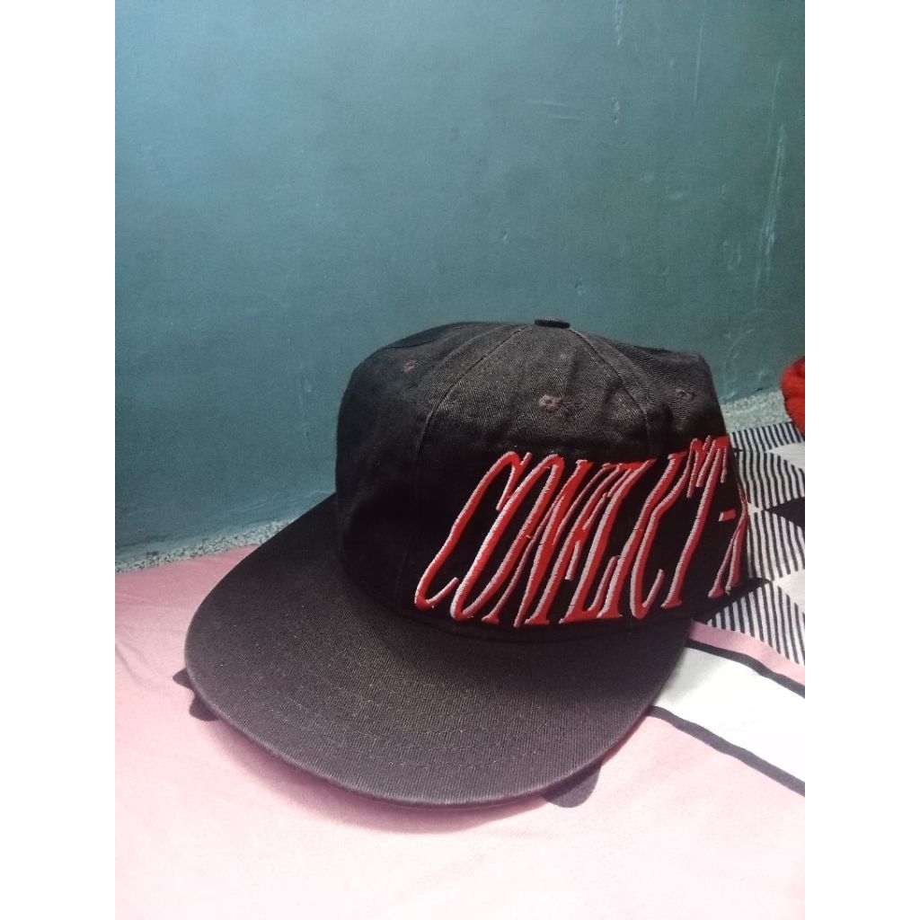 topi cx miring