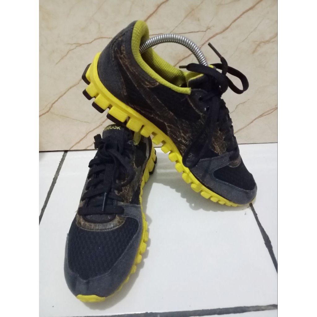 sepatu reebok realflex second
