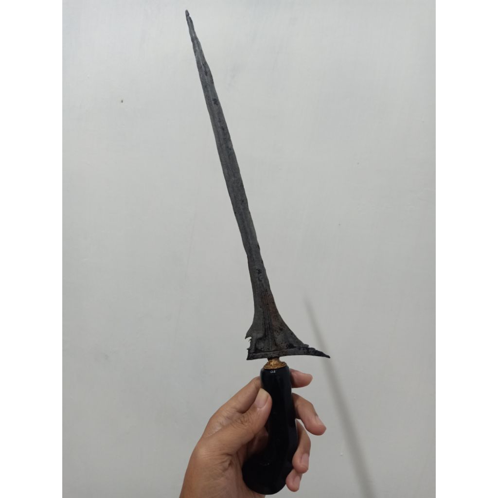 Keris Sinom
