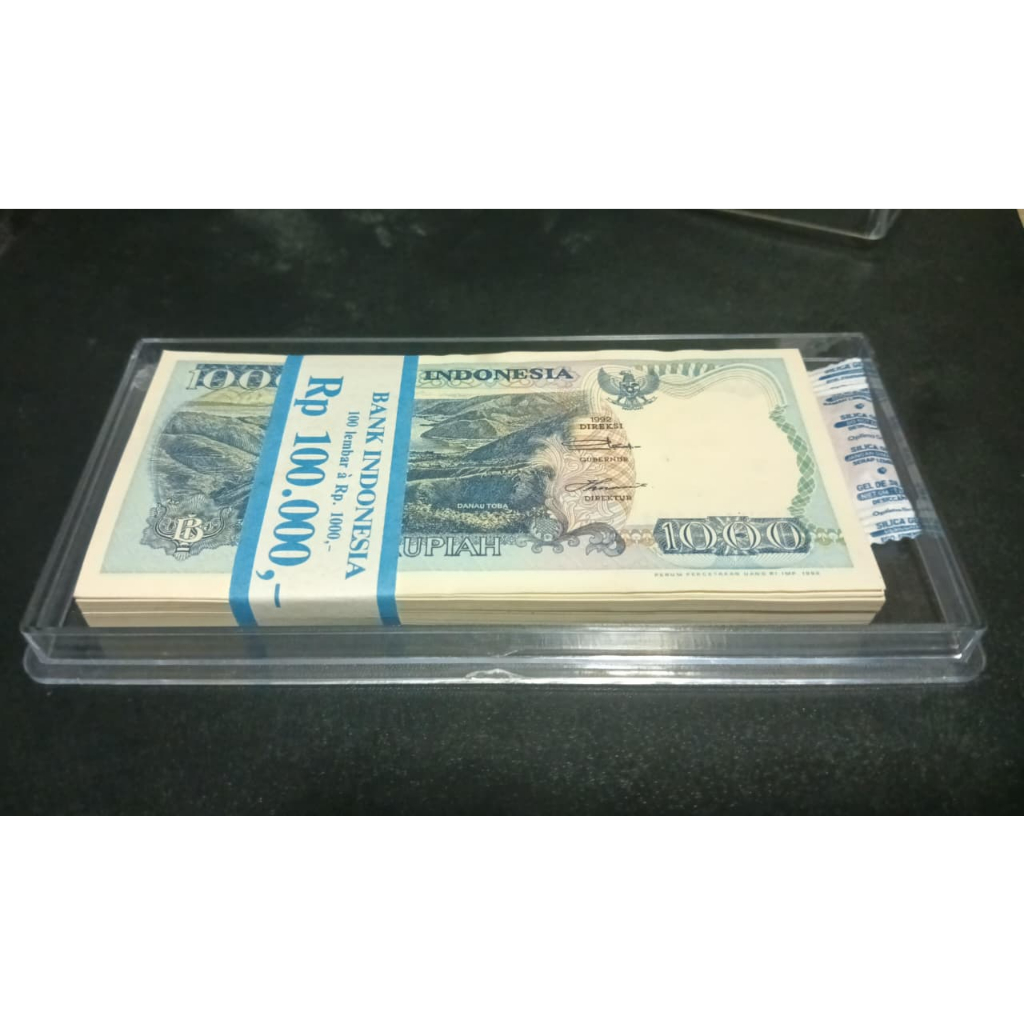 # Paket 100 lembar nomer seri urut (+ Box Acrilic) - Uang kuno 1000 rupiah tahun 1992 Lompat Batu (I