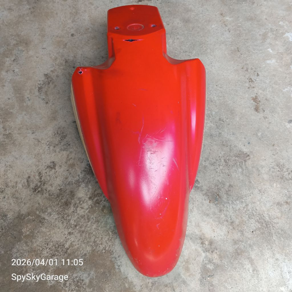spakbor depan Spin 125