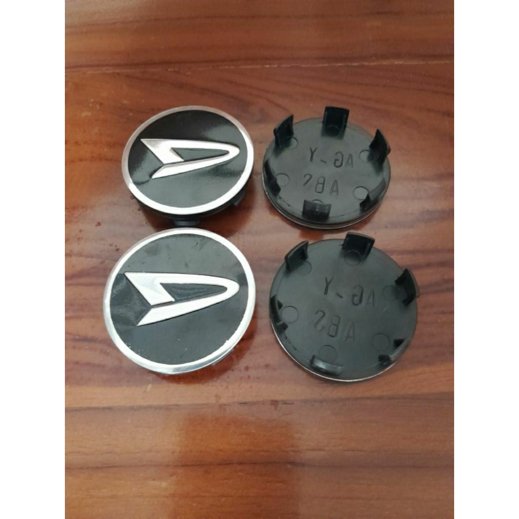 Dop roda penutup pelek mobil Daihatsu Sigra logo chrome