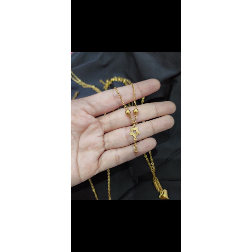 kalung perhiasan 23 krt titanium asli