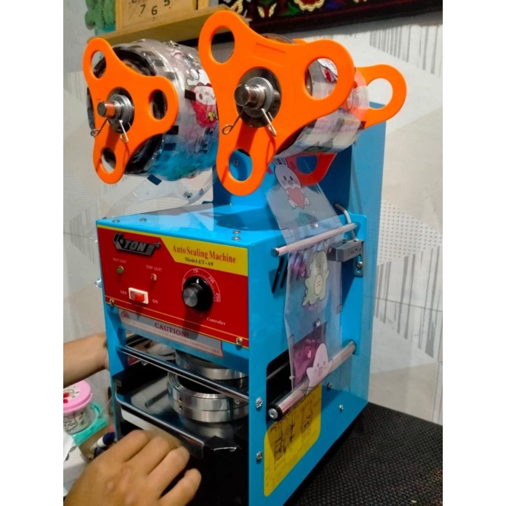 Mesin cup sealer TON ET - A9 semi otomatis