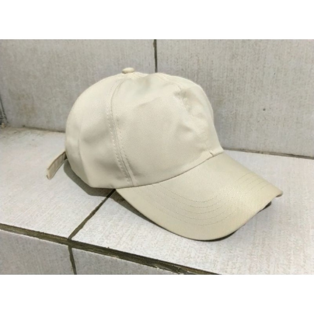 topi polos cream