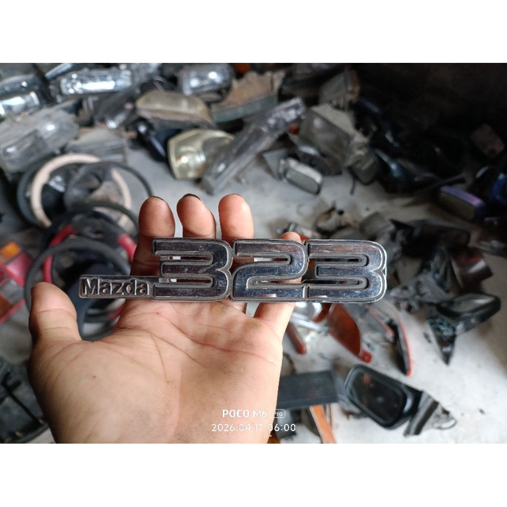 emblem mazda 323