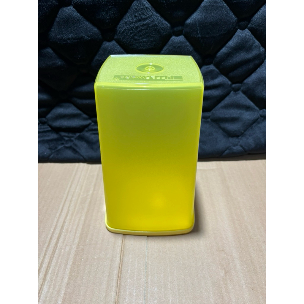 yellow tall square round tupperware