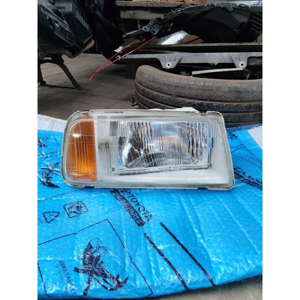 Headlamp suzuki escudo original.