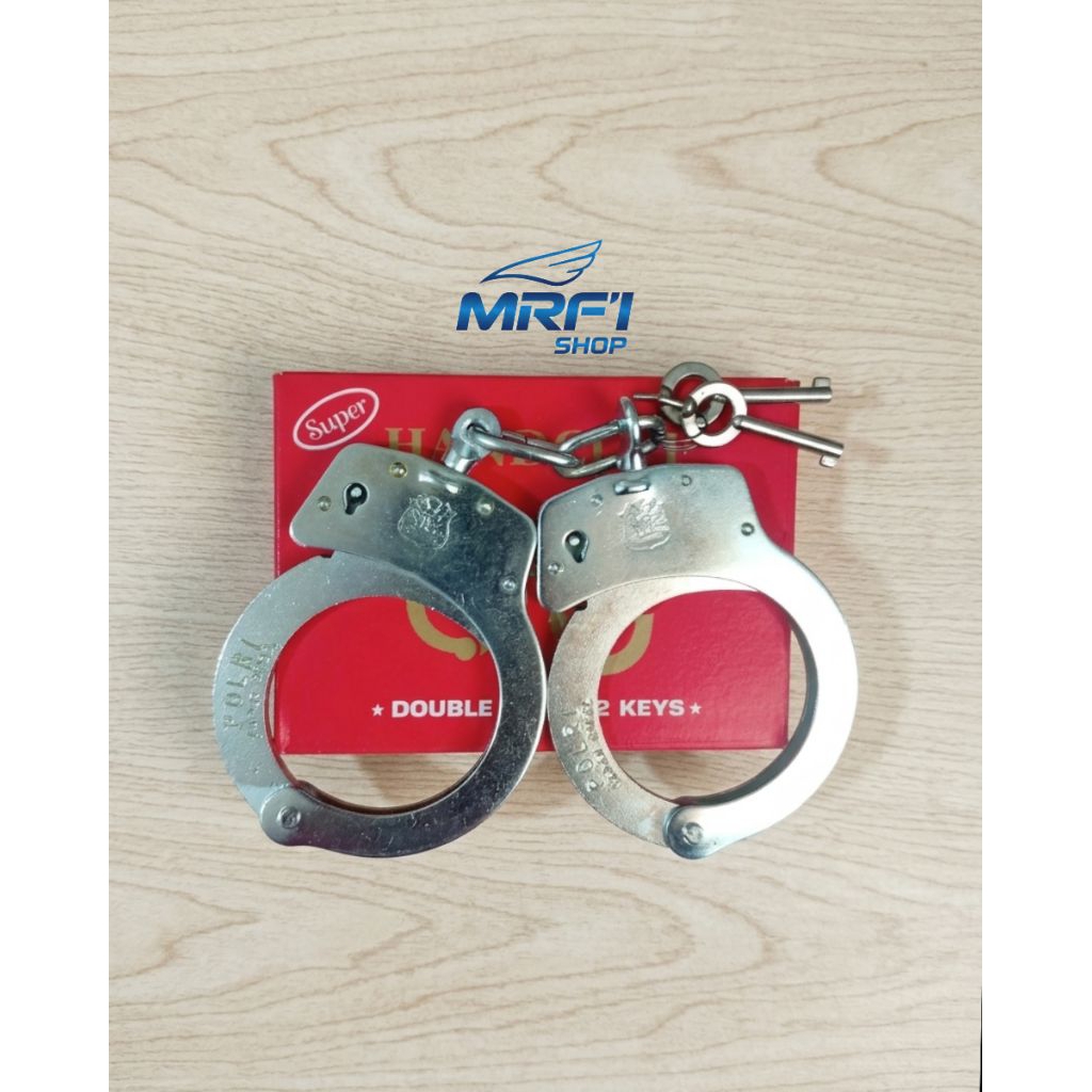 borgol tangan polisi/borgol stainless asli