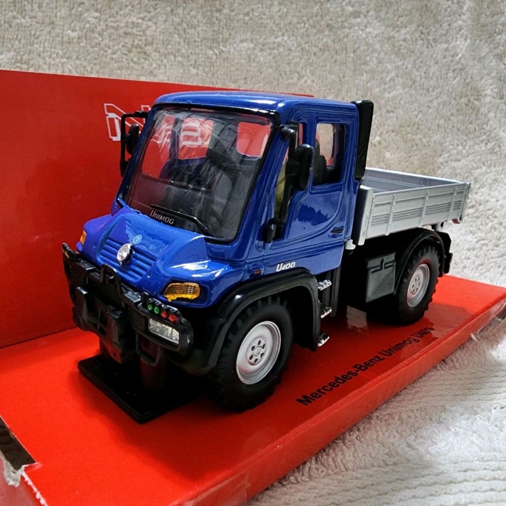 Diecast Truk Mercedes-Benz Unimog U400 Welly Nex 1:43
