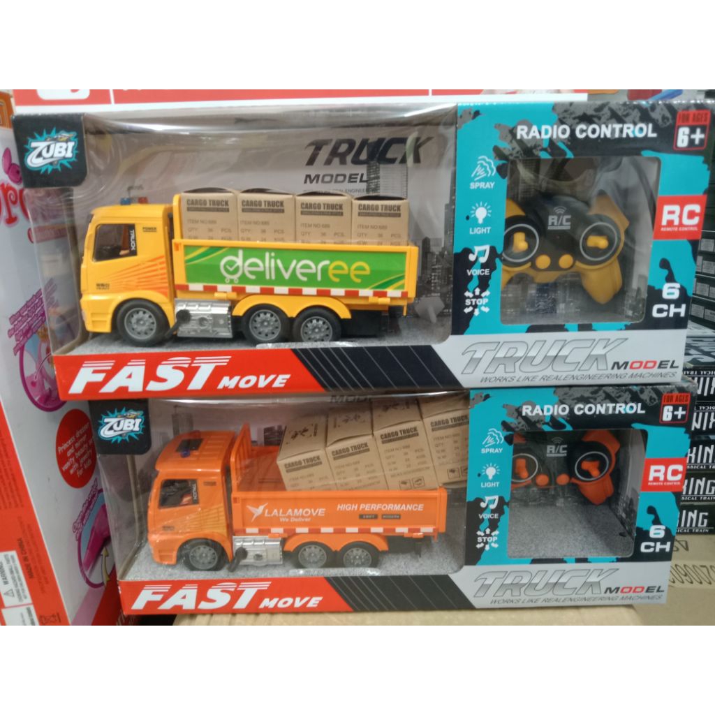 Mainan Rc remote truck fuso spray dengan baterai AA