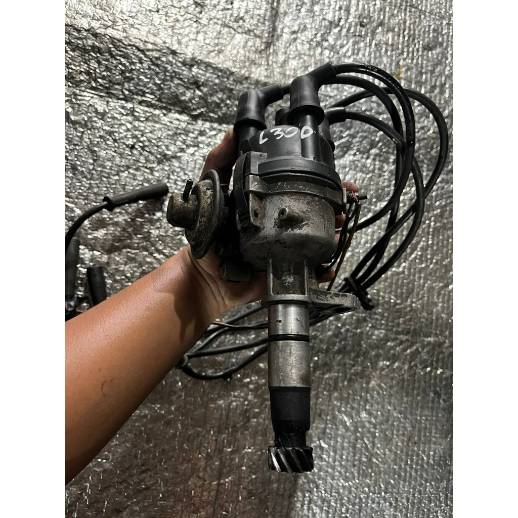 Delco L300 Bensin Platina Ori Copotan