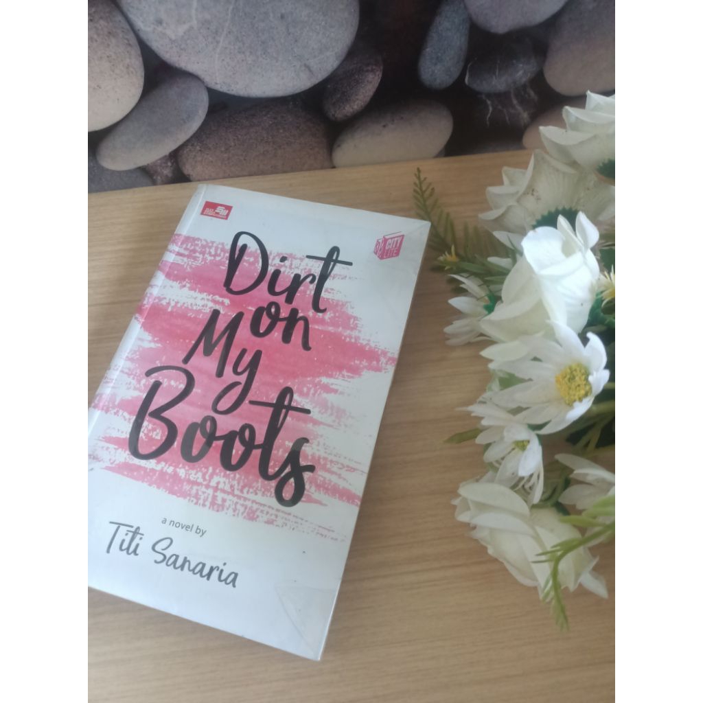 Preloved novel Dirt on my boots By Titi Sanaria