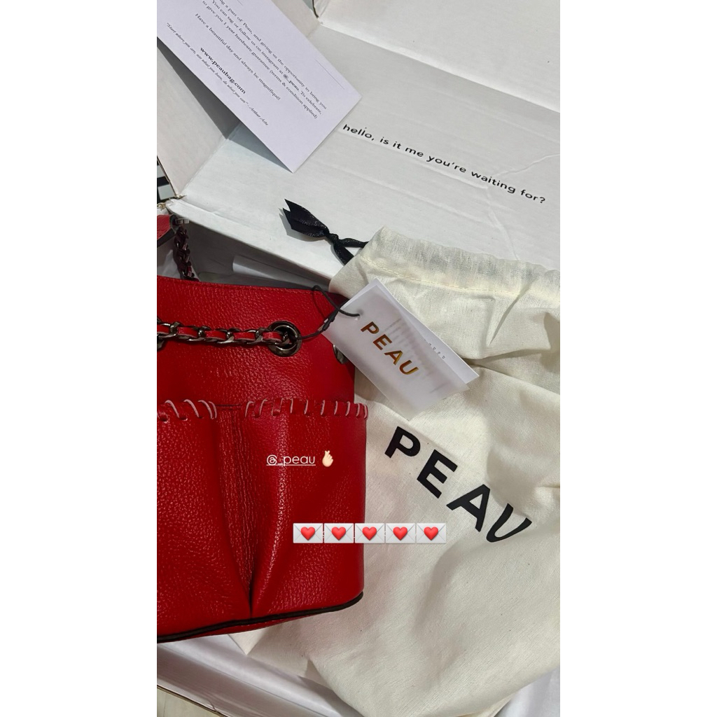 preloved peau bag merah