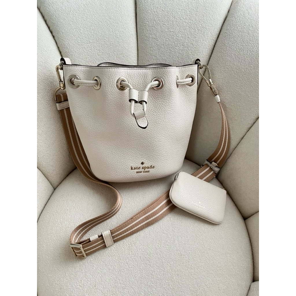 Preloved kate spade rosie small bucket bag pebbled leather warna putih broken white pl katespade sec