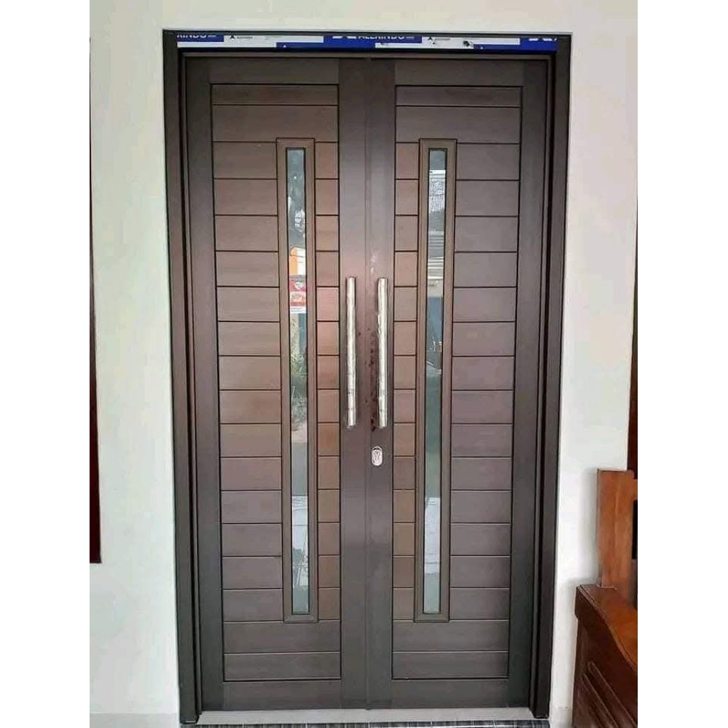 pintu aluminium model kupu kupu