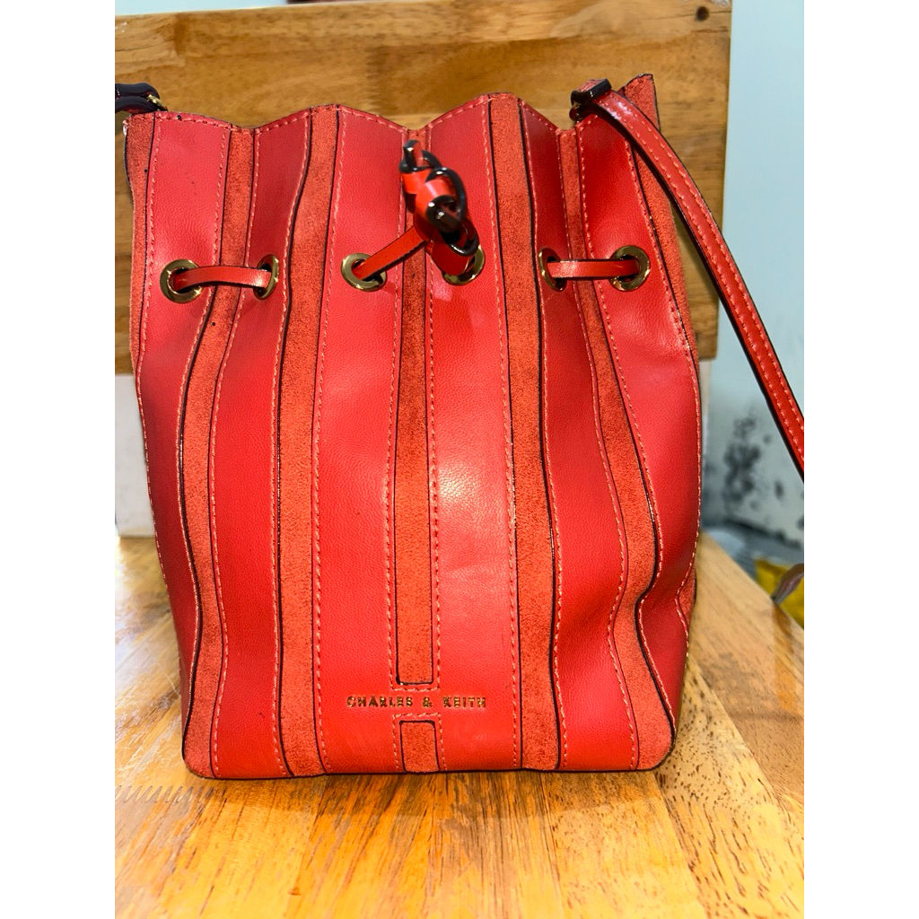 tas serut charles and keith orange