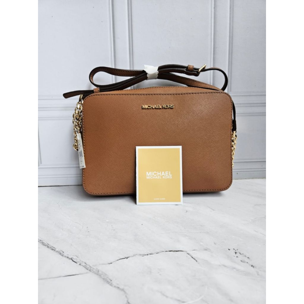 mk sling jet set