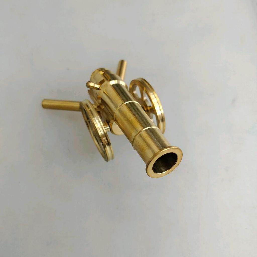hiasan meriam mini kuningan