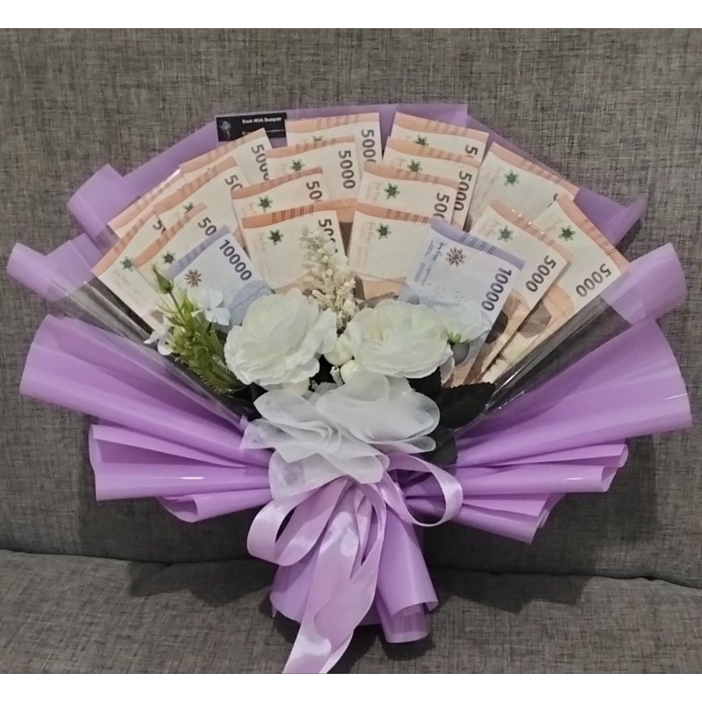 buket uang segala event. harga yg tertera termasuk uang dgn nominal Rp. 100.000 ya. pecahan uang bis
