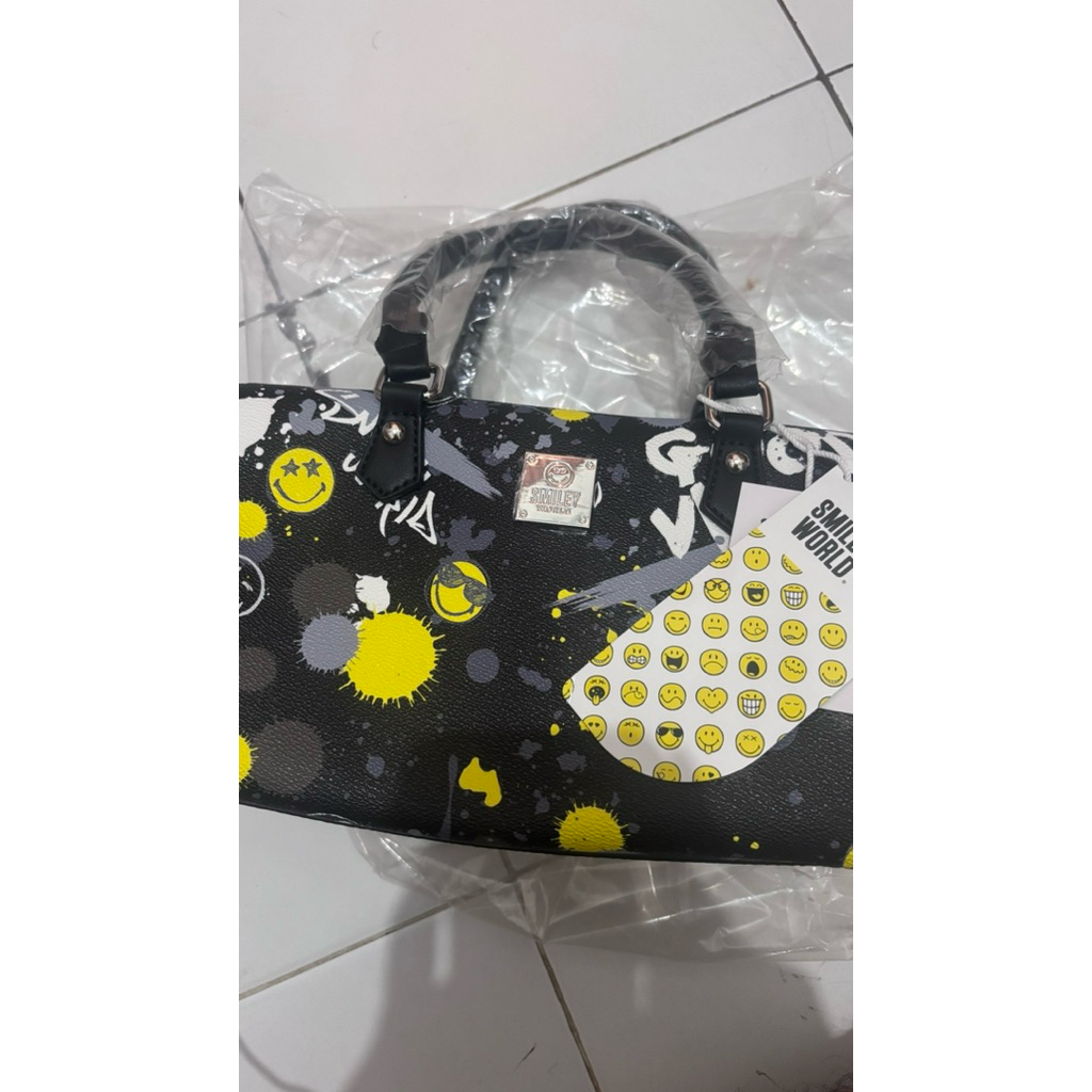smiley world traveling bag