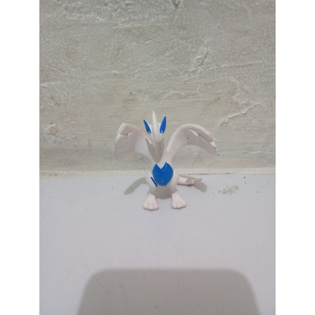 mainan figure pokemon lugia Tomy