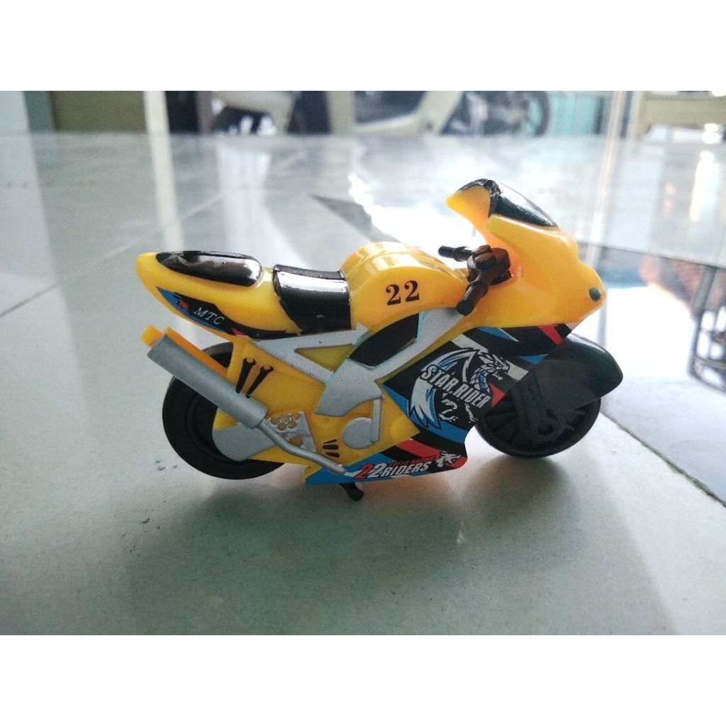 Motor Balap Spin go Besar