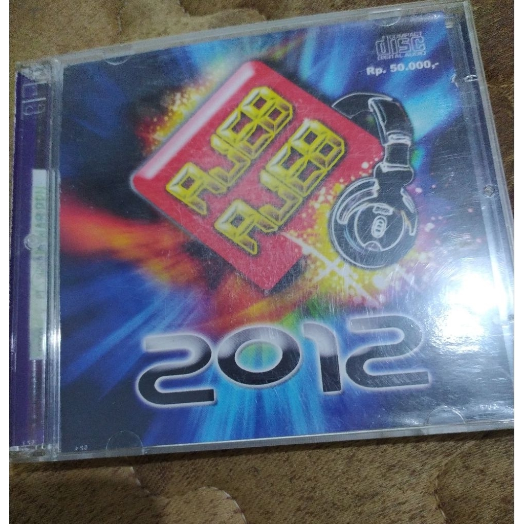 CD Audio Cyber DJ Team - Ajeb Ajeb 2012 (PT.Suara Mega Mandiri)