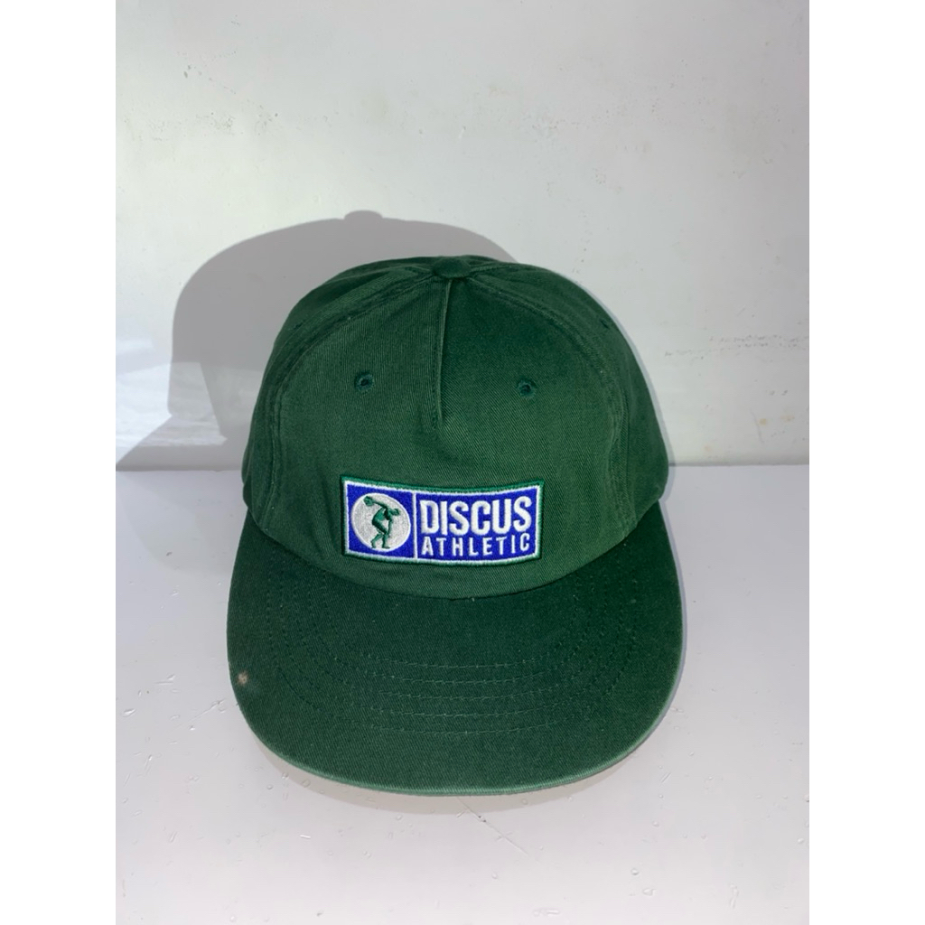 Topi discus athletic hijau