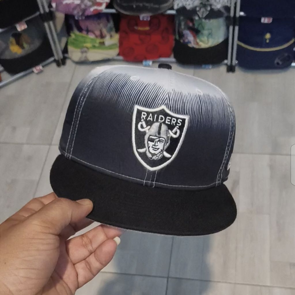Topi Raiders NFL