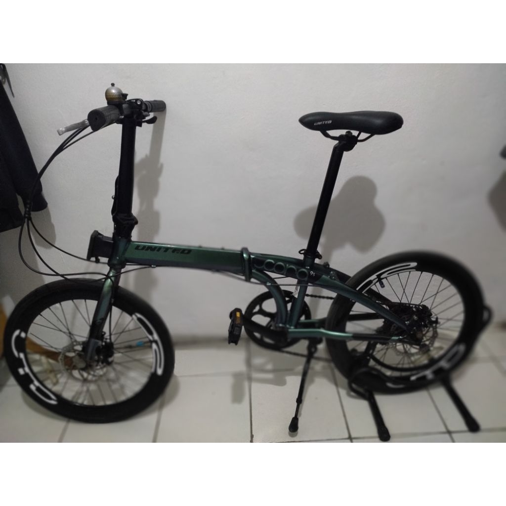 sepeda lipat United Cora 9s (Bekas)