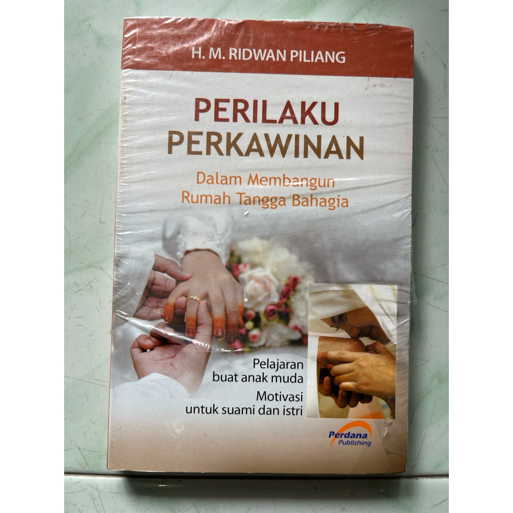 BUKU PERILAKU PERKAWINAN DALAM MEMBANGUN RUMAH TANGGA BAHAGIA