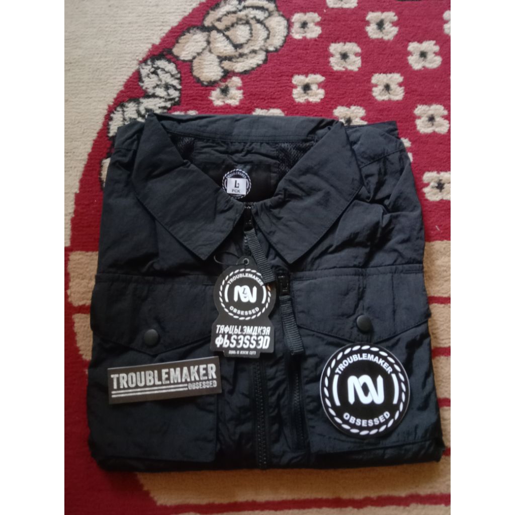 jaket tm ovs size L Kondisi new