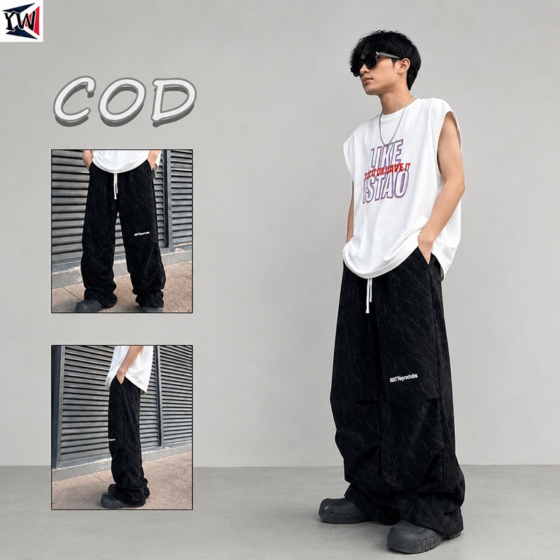 Bordir logo celana hitam pria Celana corduroy tipis celana panjang pria karet pinggang Gombrang cela