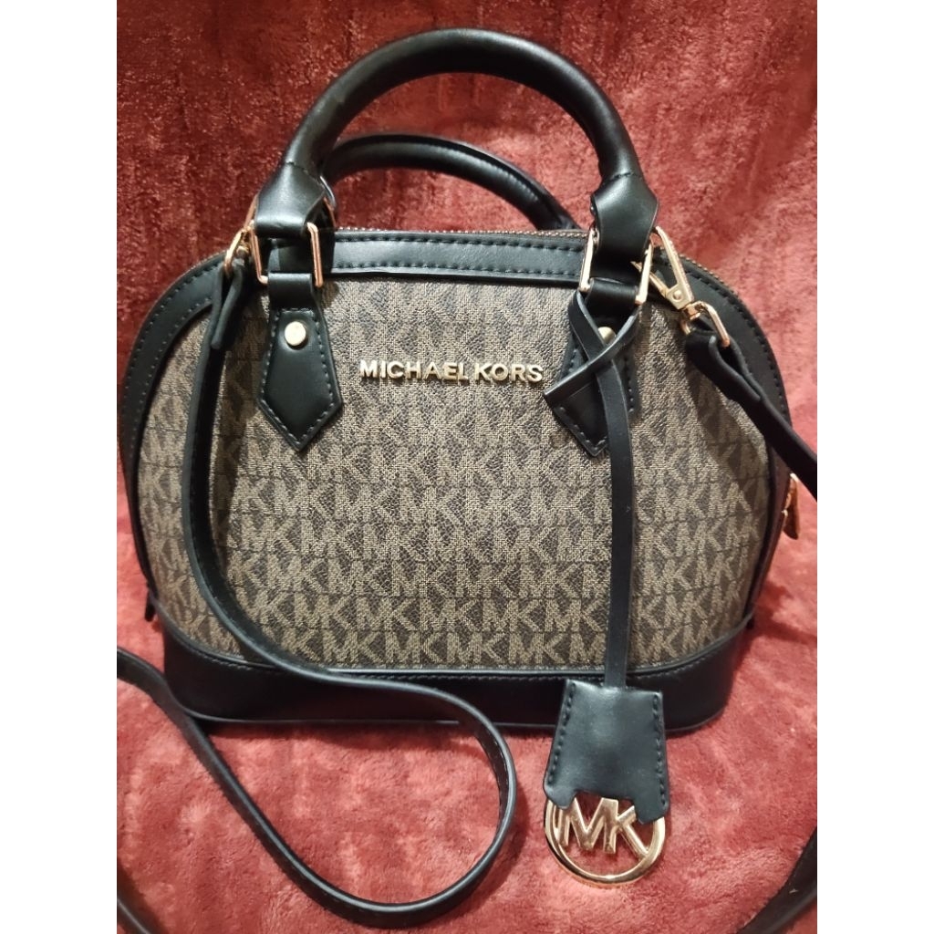 Preloved tas MK Alma motif monogram cokelat klasik