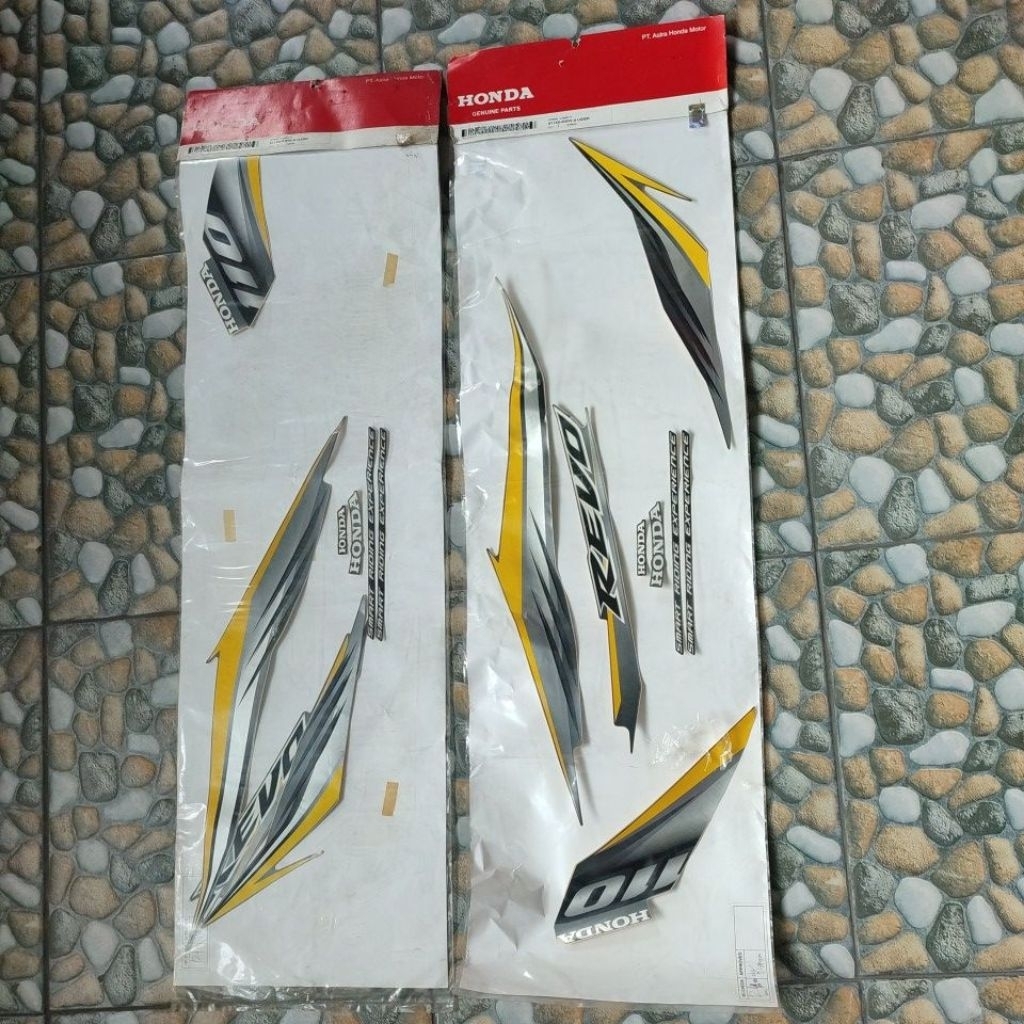 STRIPING LIST STIKER POLET COVER BODY HONDA REVO ABSOLUTE ABU ABU KUNING 2009 ORIGINAL AHM 871X0-KWW