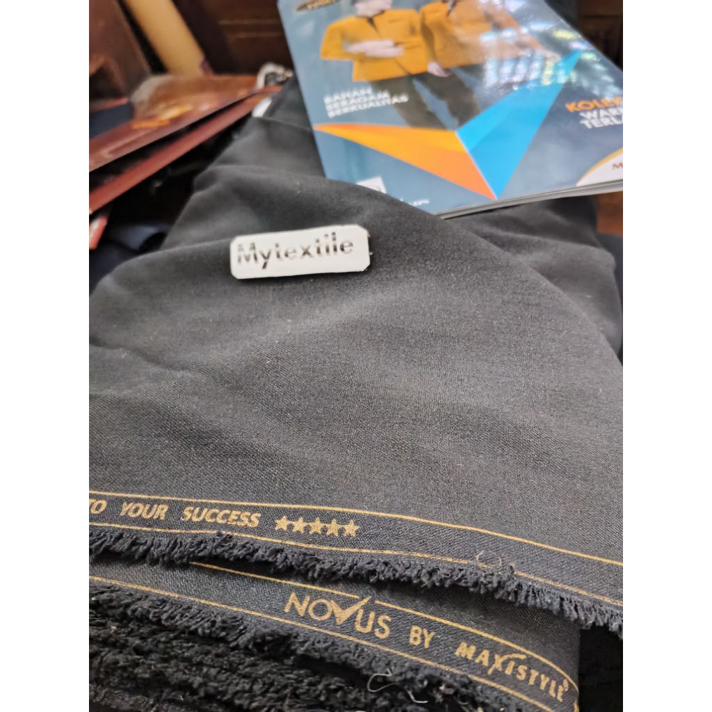 kain novus hitan bahan seragam wool sensation