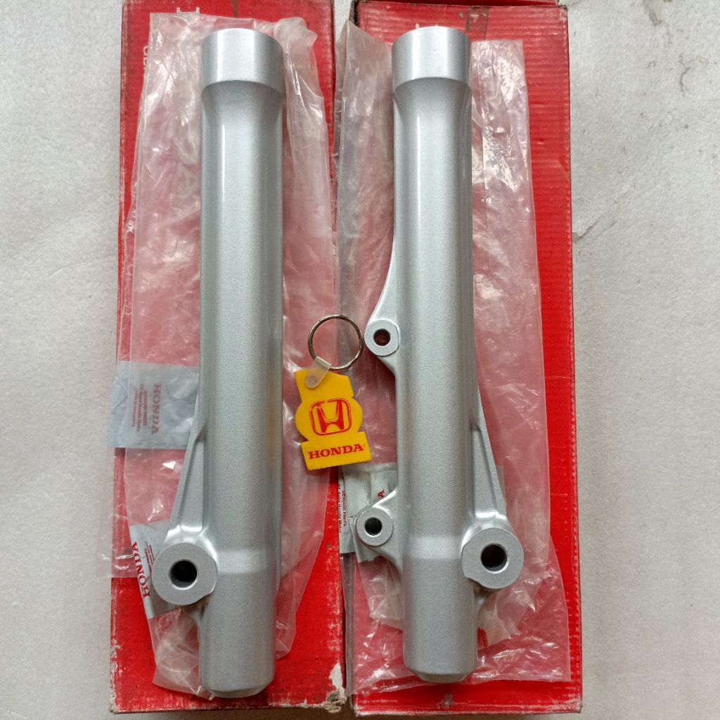 COVER BOTTOM SHOCK TABUNG SHOCK DEPAN KIRI KANAN SUPRA X 100 CAKRAM ORIGINAL