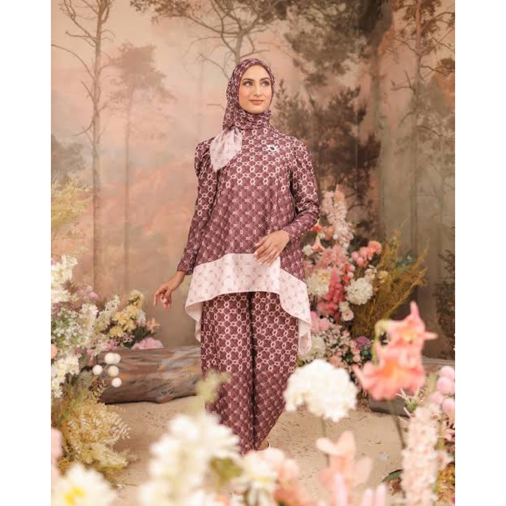 wearing klamby calya blouse lava size M