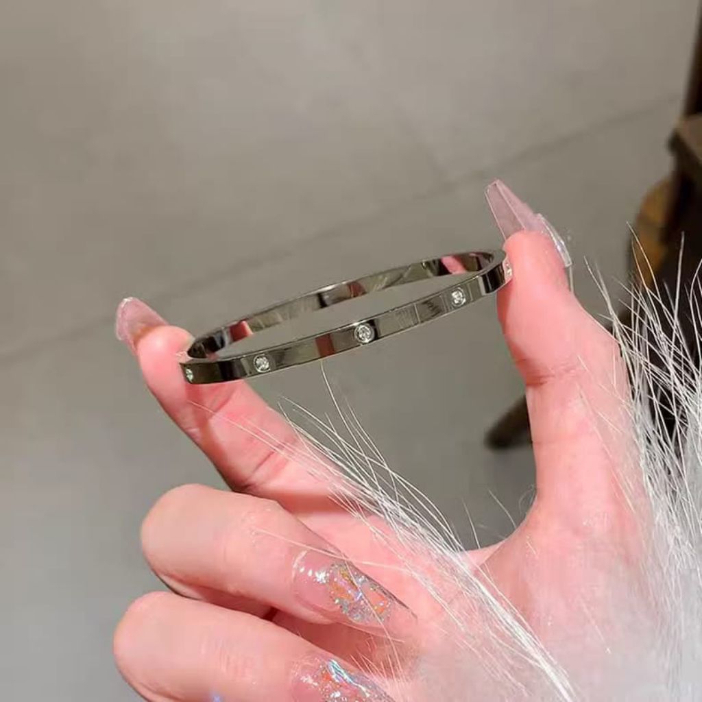 gelang titanium berlapis radium emas viral