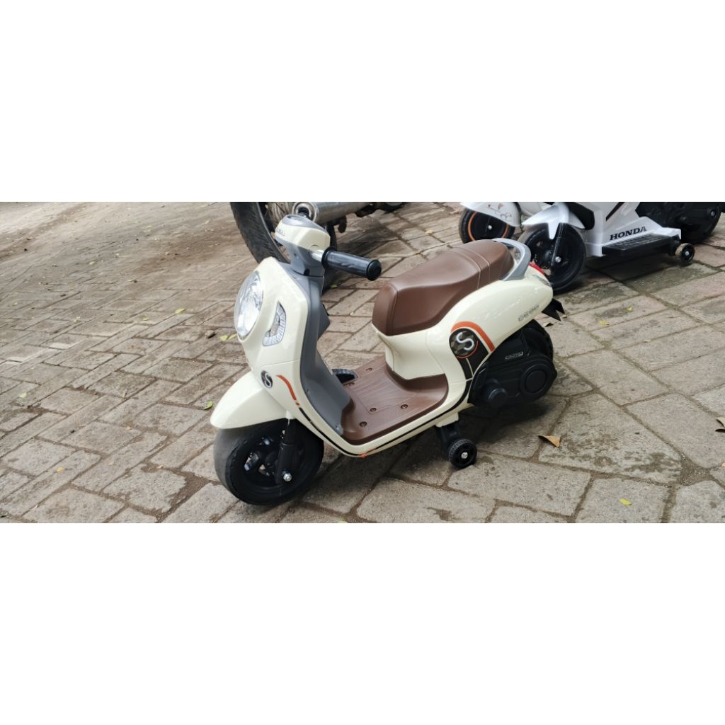 Sepeda anak listrik model scopy bekas rasa baru