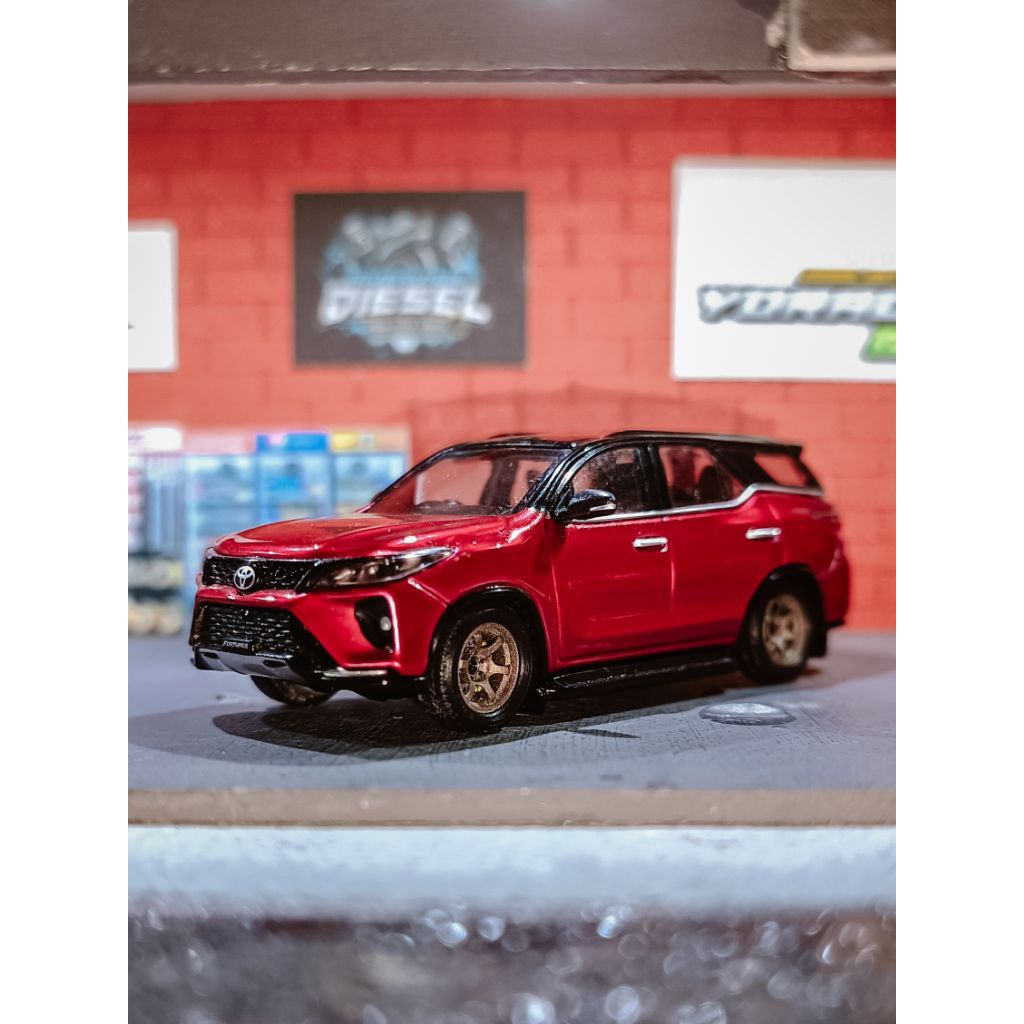 Fortuner para 64 merah