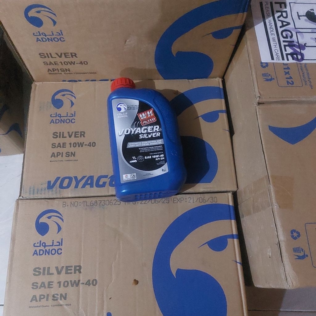 1 dus isi 12 oli mesin adnoc voyager silver original
