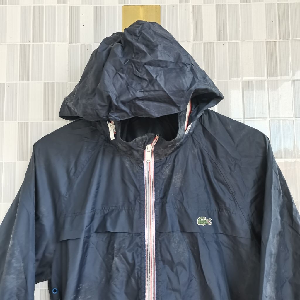 1488. HOODIE ZIIP WINDBREAKER POKETEABLE LACOSTE WARNA NAVY SIZE L  PRELOVED