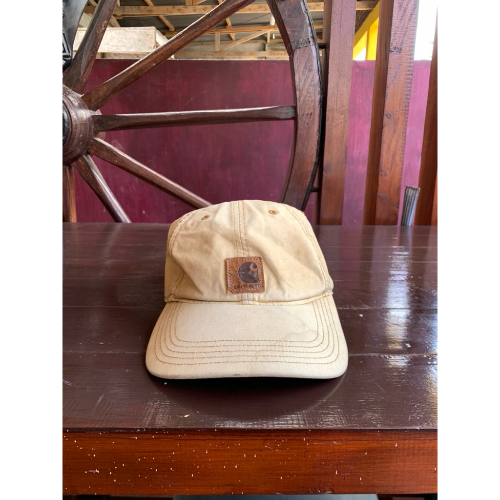 [preloved] topi pria carhartt outdoor cream center logo second - bekas